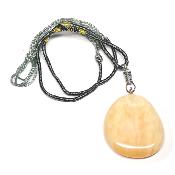 Calcite Orange avec cordon - pendentif pierre plate